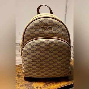 New! Michael Kors ABBEY LG BACKPACK. It still has original packaging inside.